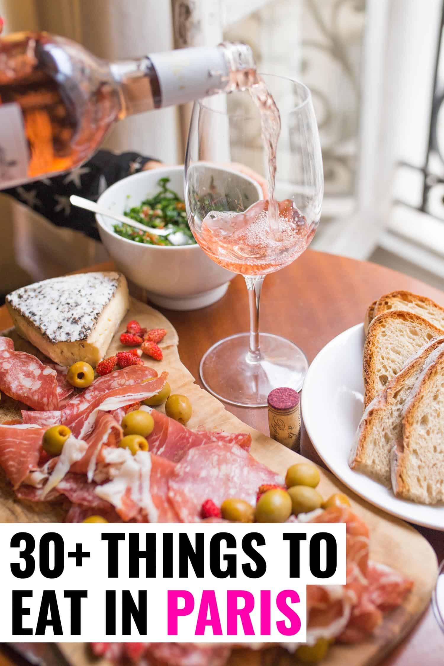 plate of charcuterie and rose wine in a restaurant in Paris