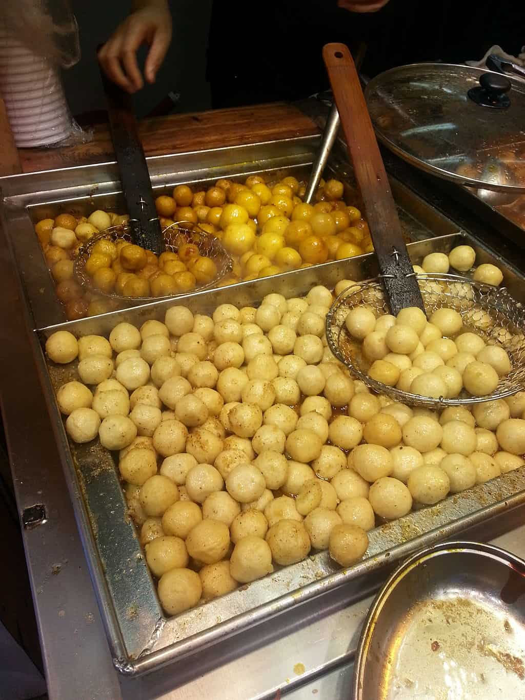 Traditional Hong Kong cuisine as a street food - fish balls.