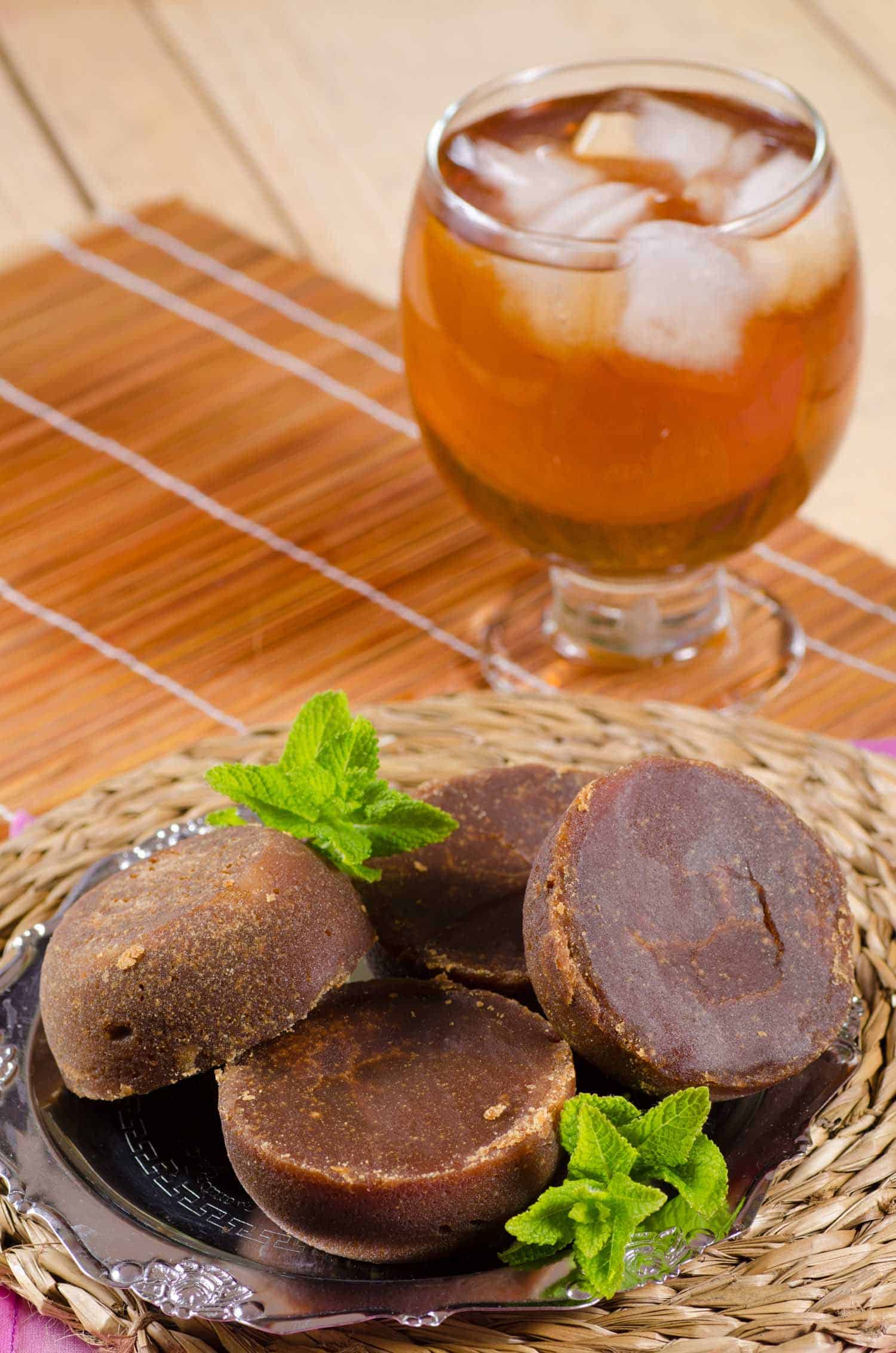 Aguapanela, traditional Latin American drink prepared with raw brown sugar panela.