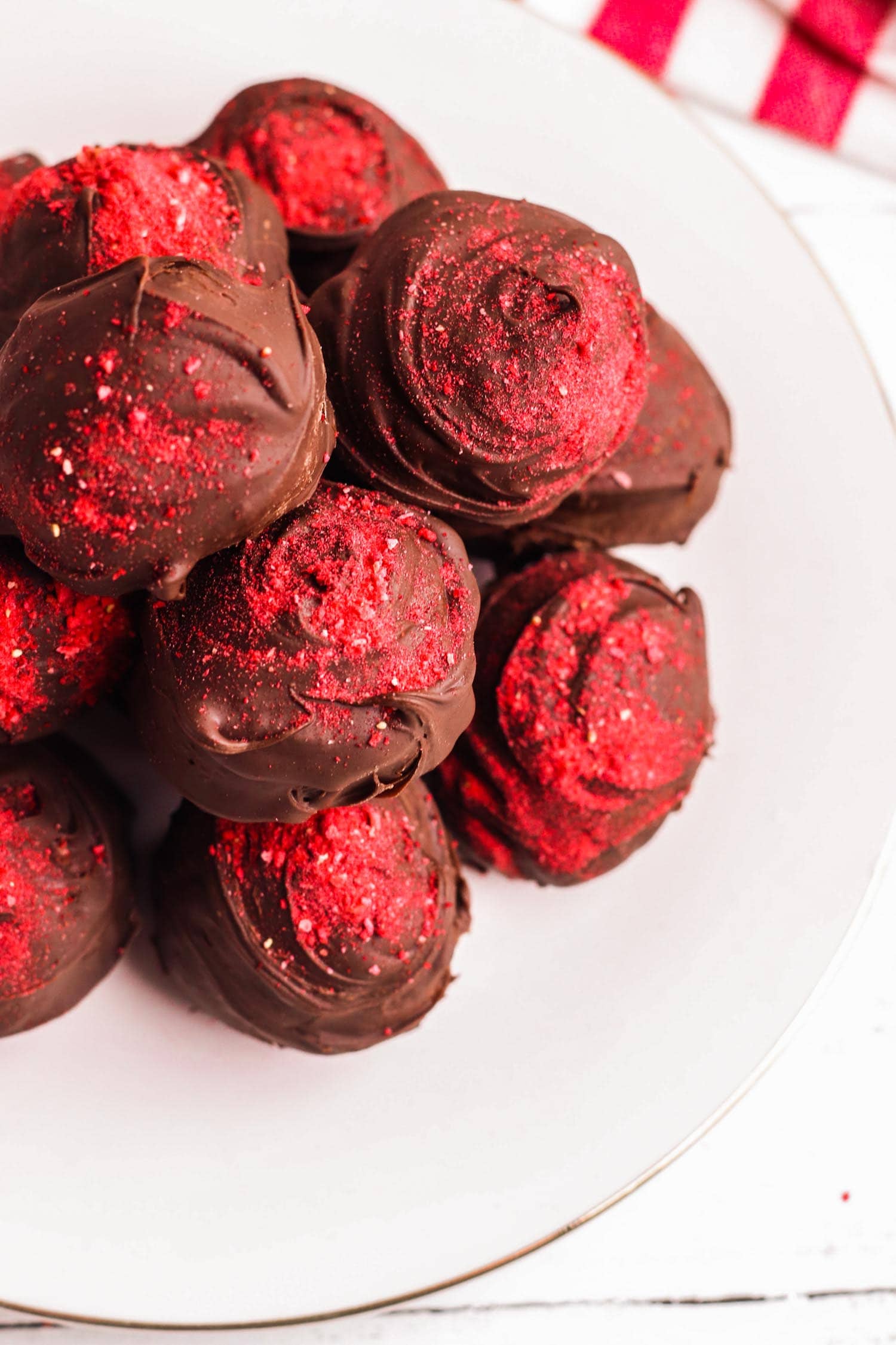 Chocolate strawberry truffles on a plate