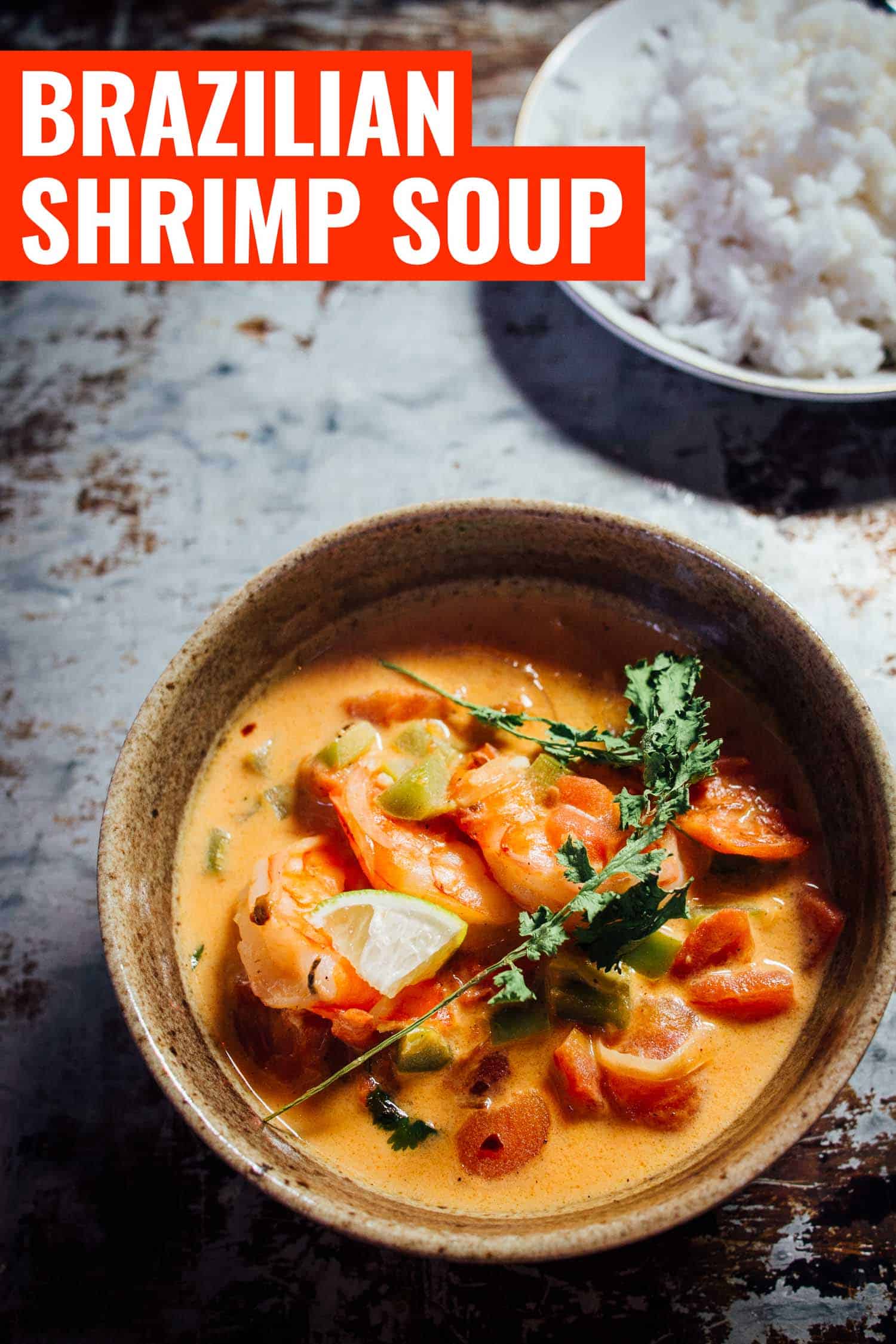Brazilian shrimp soup in a white bowl on a rustic background