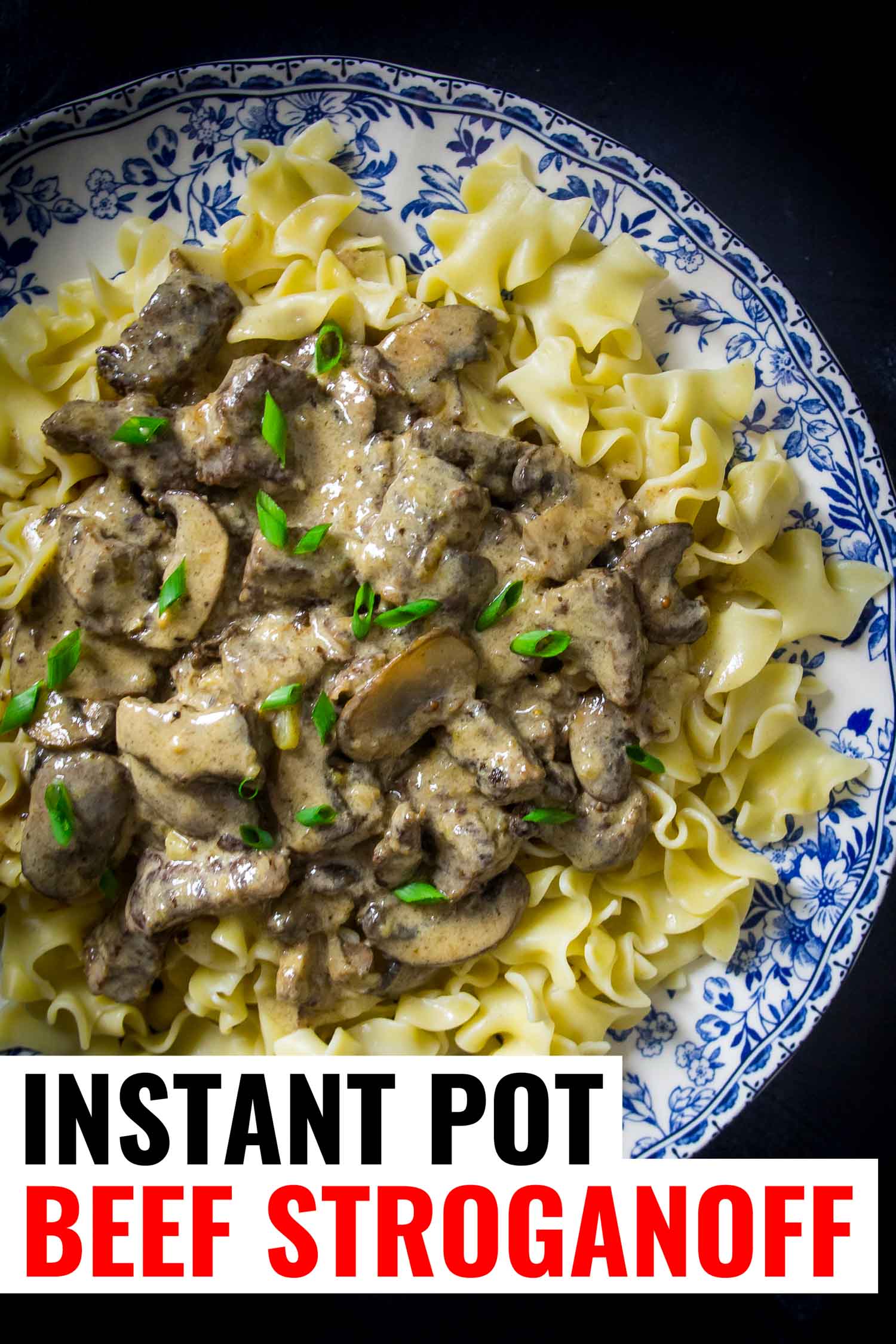 Egg noodles and beef on a blue background