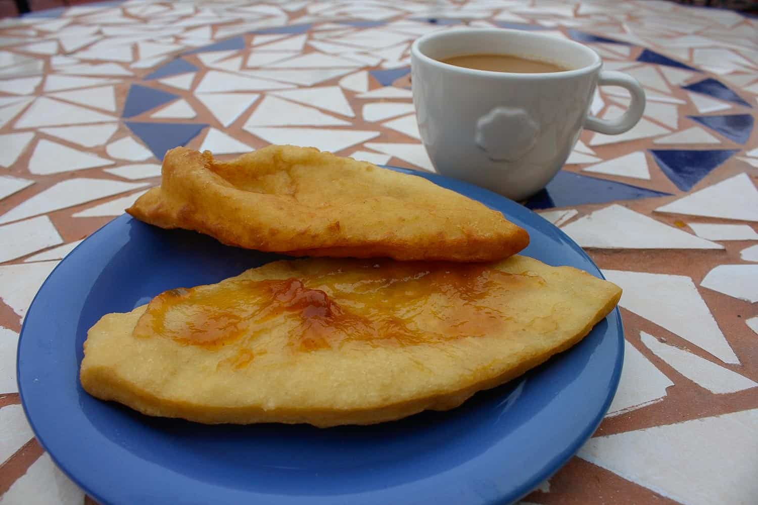 Breakfast Belizean food fry jacks with coffee