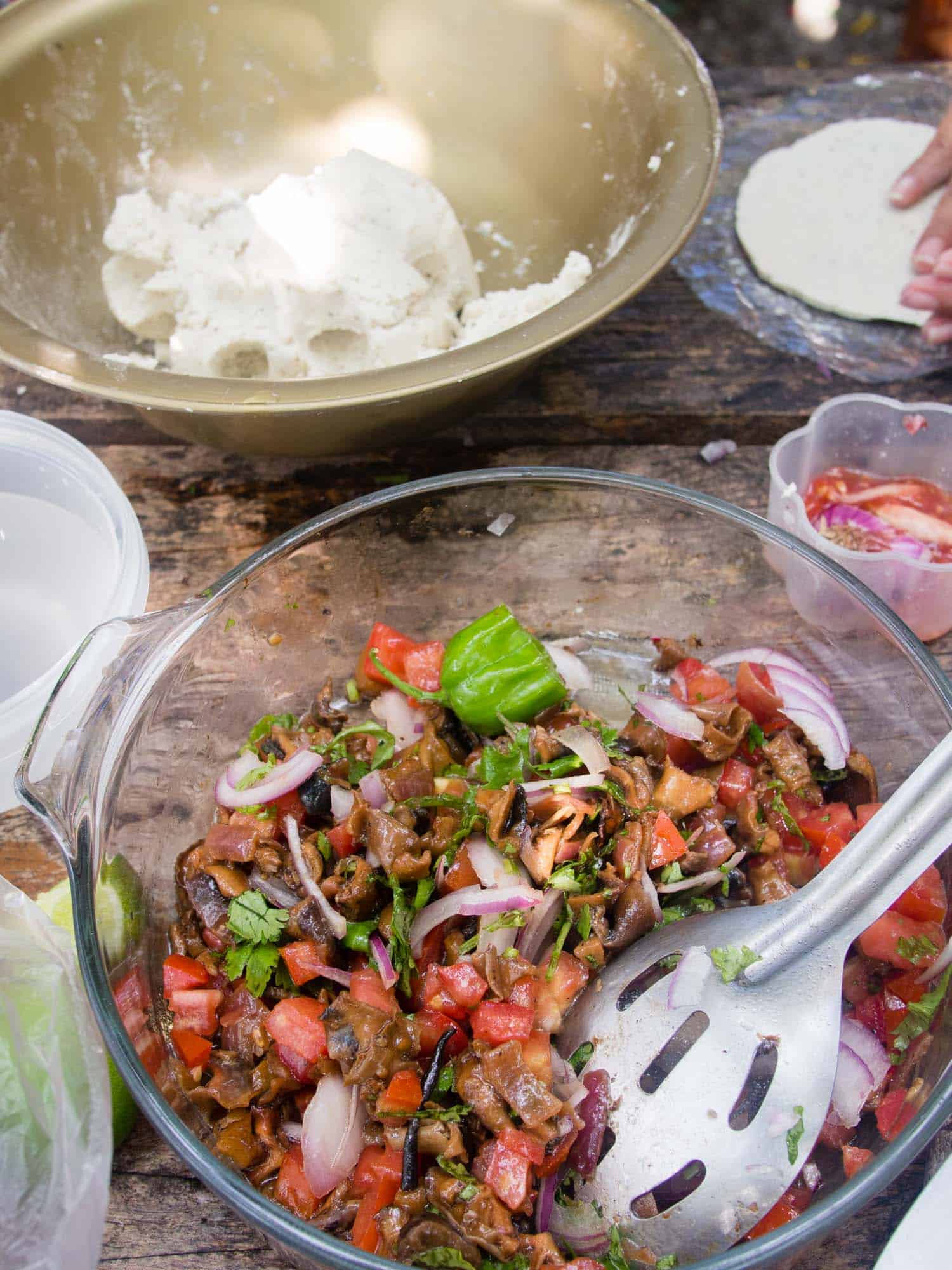 Conch ceviche in a clear bowl.