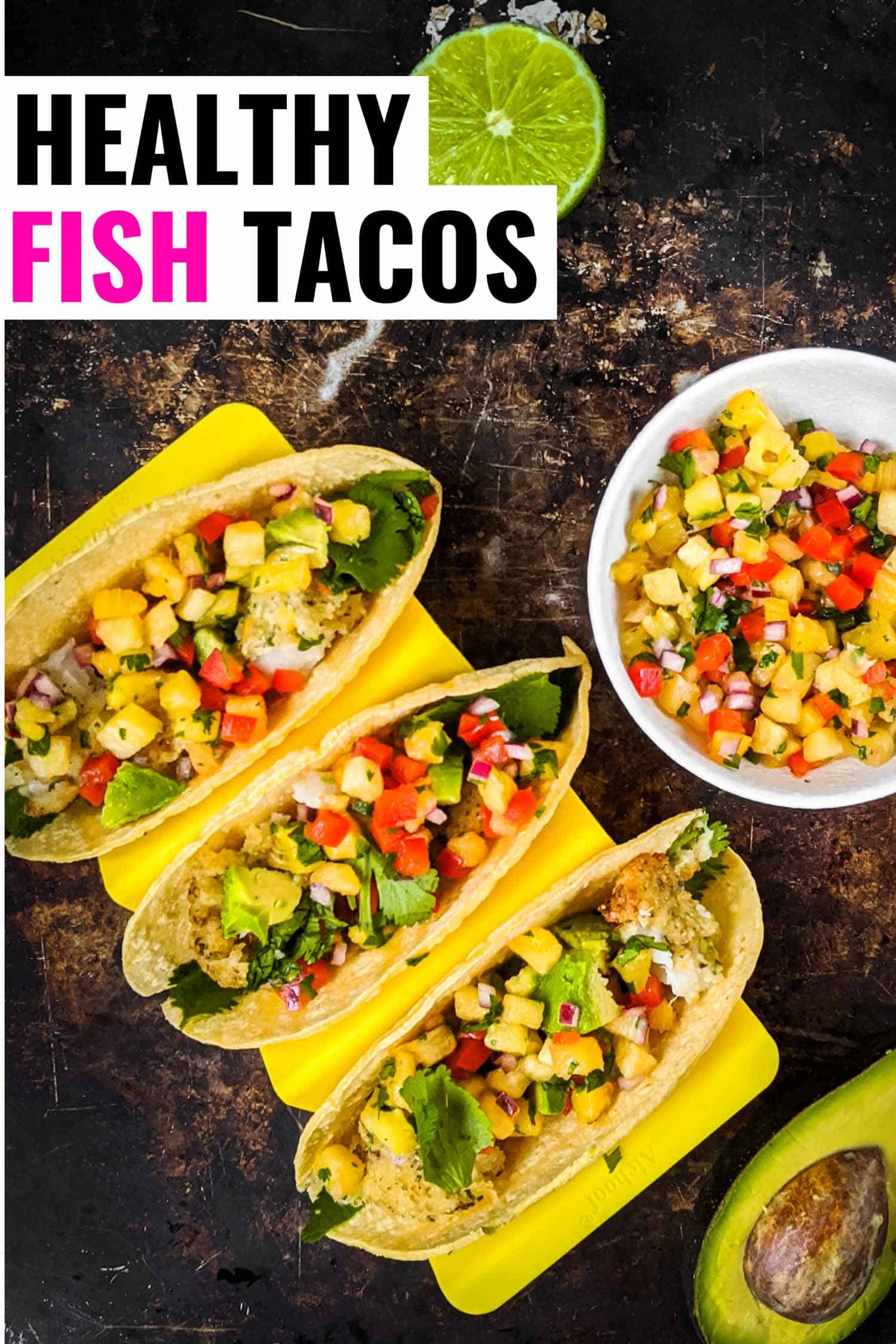 Healthy fish tacos with pineapple red pepper salsa on a dark background