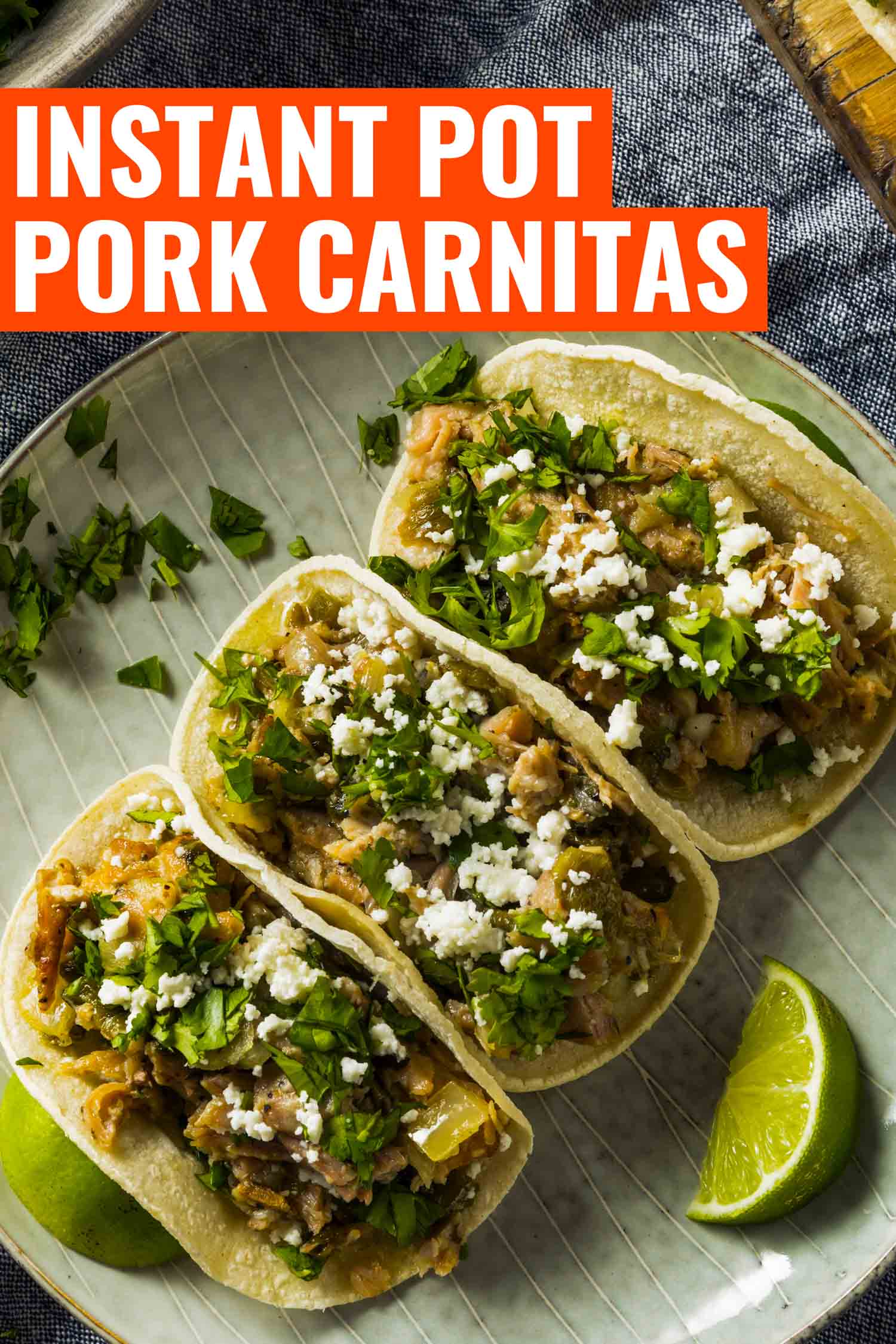 Pork carnitas tacos on a plate.