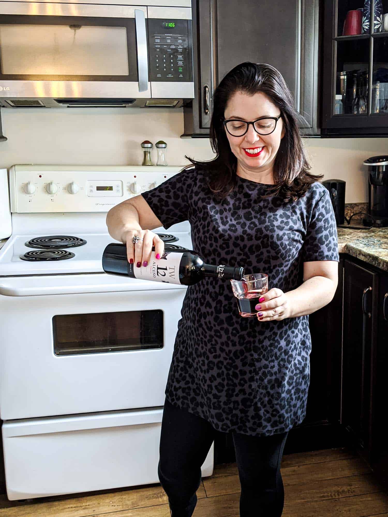 Ayngelina pouring wine from Spain in a glass