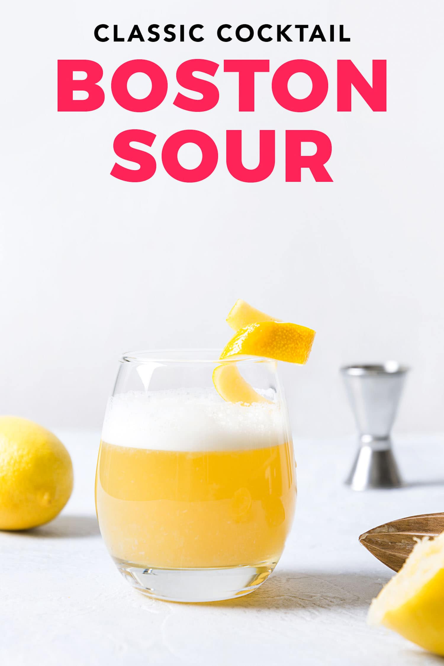 Boston sour cocktail - bourbon with lemon juice, sugar syrup and egg white in glass. Vertical orientation.