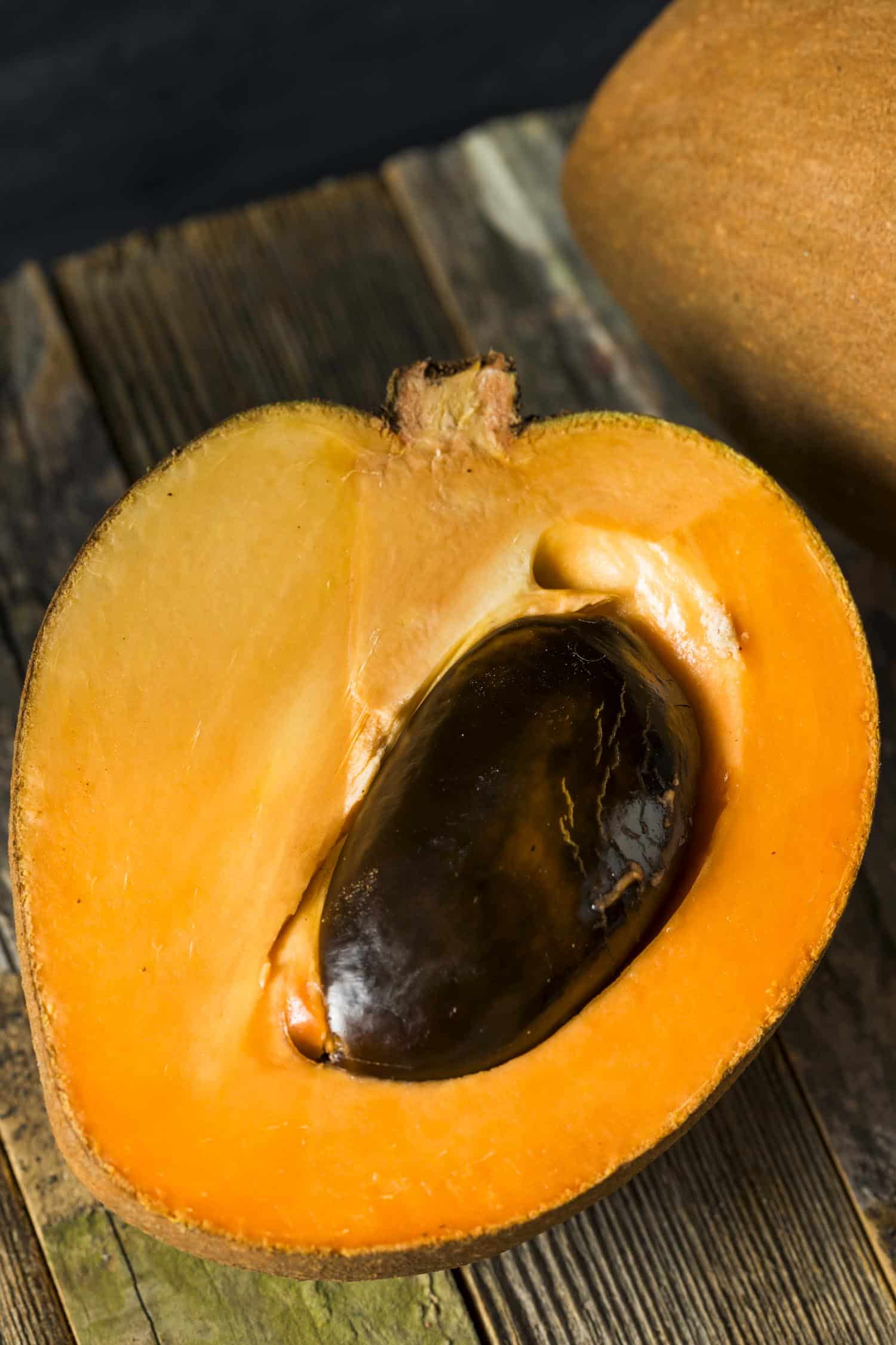 Sapote in Hawaii. Raw Organic Brown Mamey Fruit with a Brown Seed