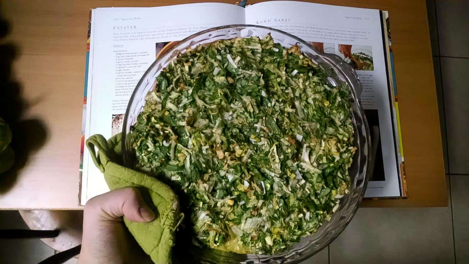 Kuku Sabzi a popular Now ruz food vegetarian dish of a frittata with herbs.