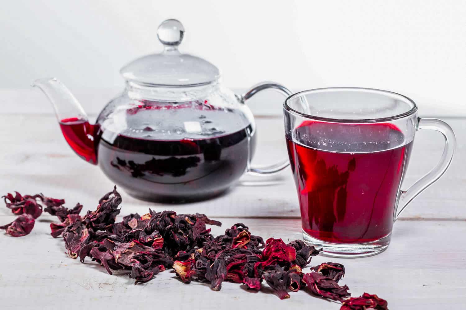 Jamaican drink sorrel tea dried flowers, tea pot and glass 