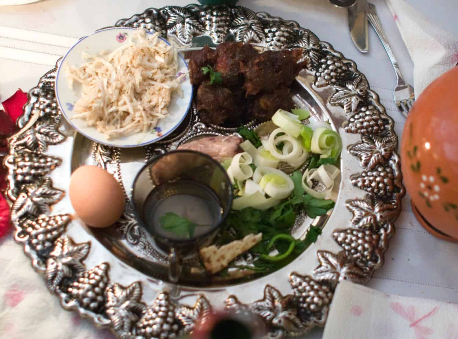Passover seder plate with symbolic passover food.