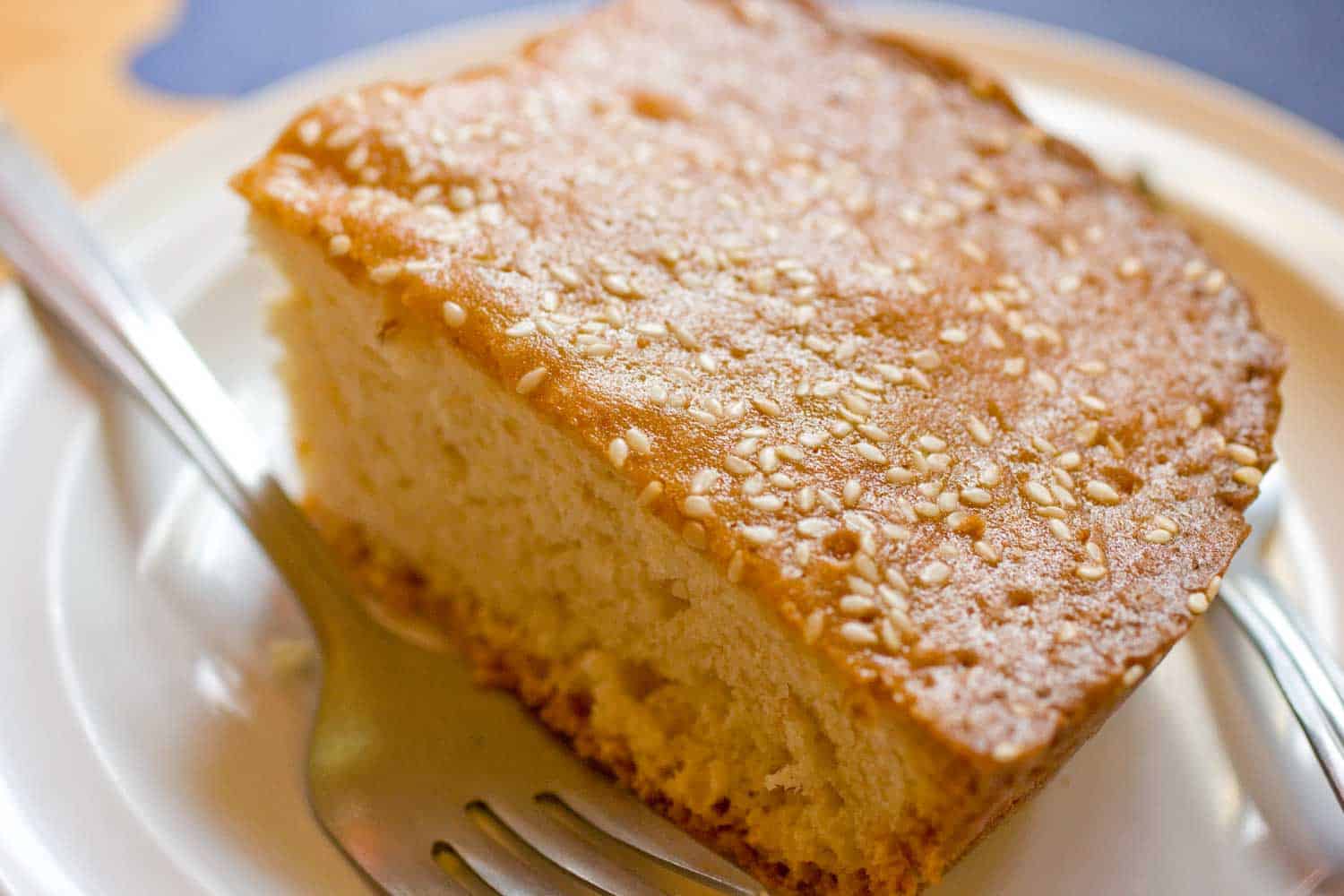 Quesadilla cake, a common Honduran dessert on a plate with a fork