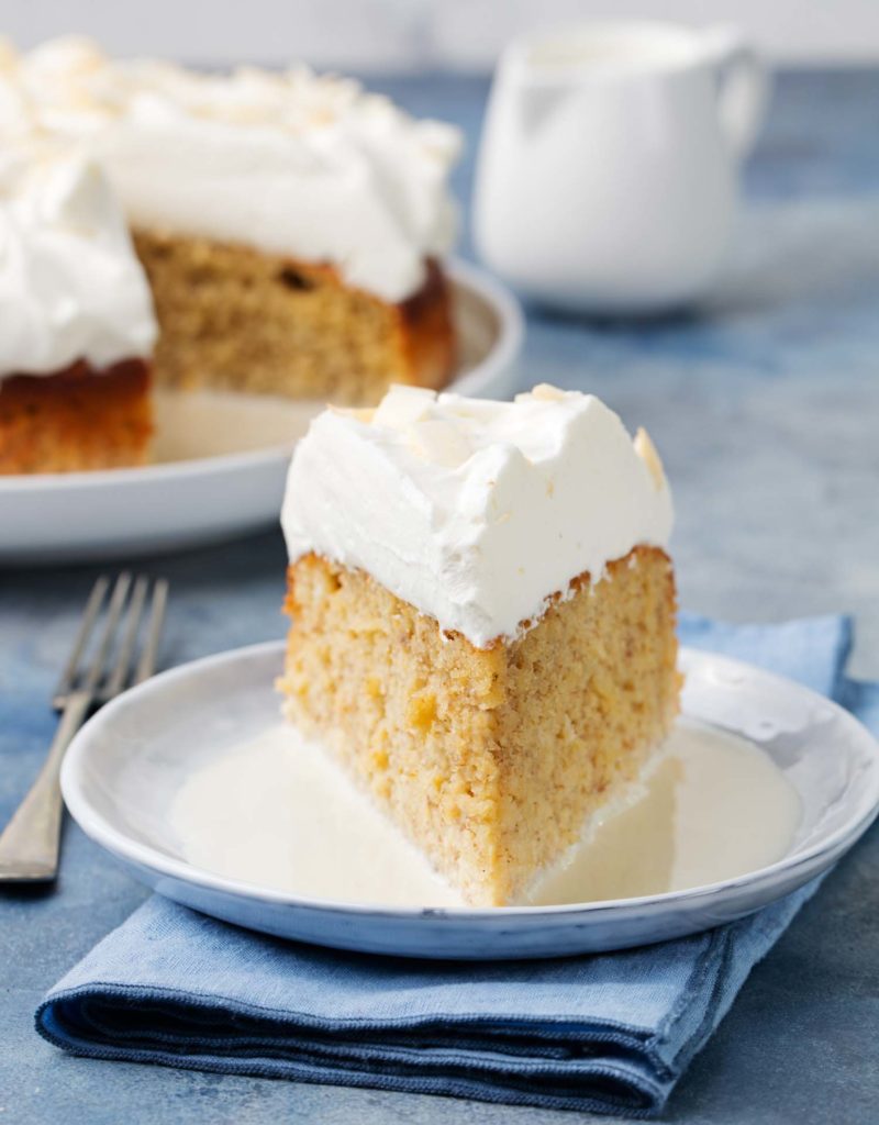 Three milk cake, tres leches cake with coconut. Traditional dessert in Honduras.