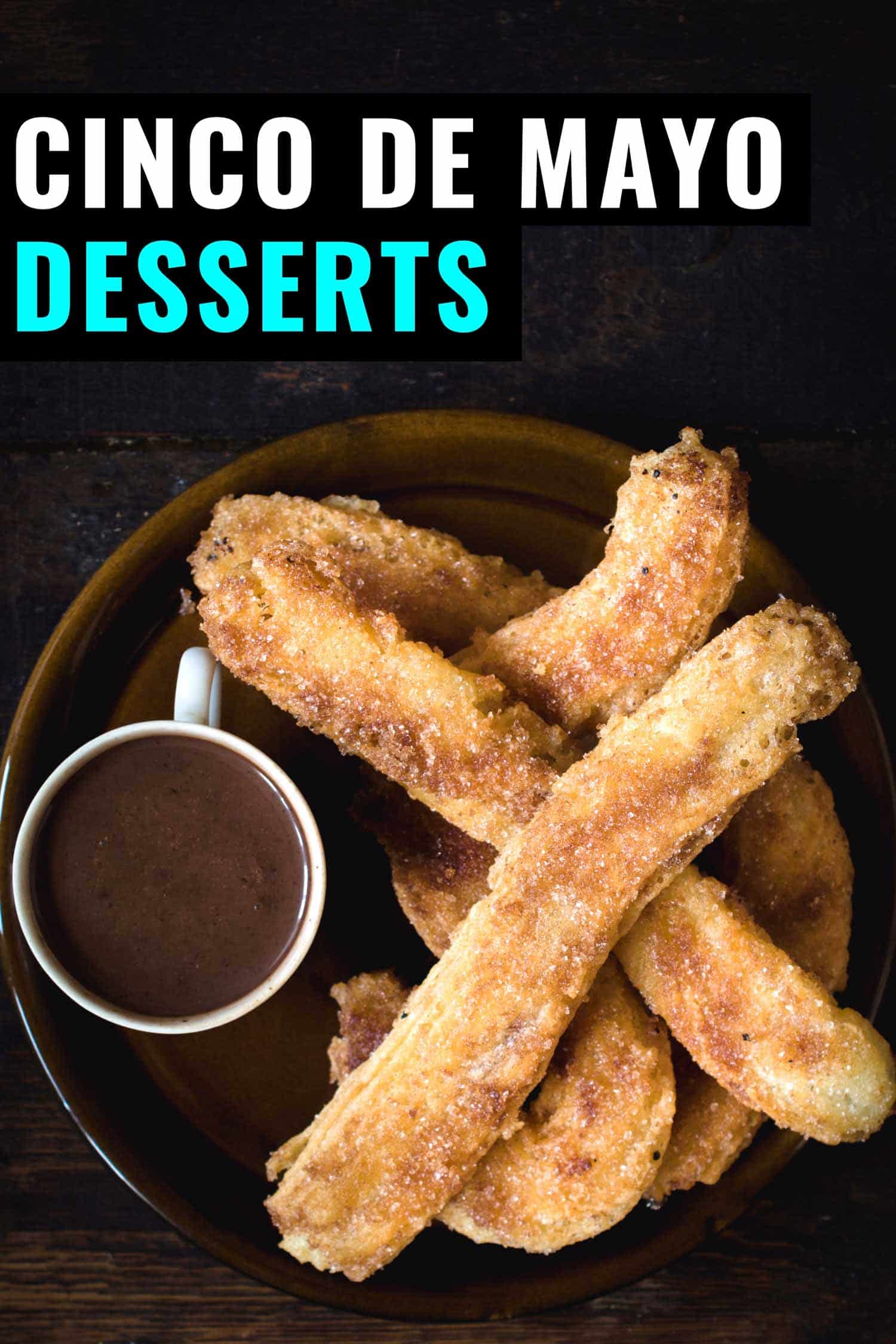 Churros and chocolate on a brown plate and brown background