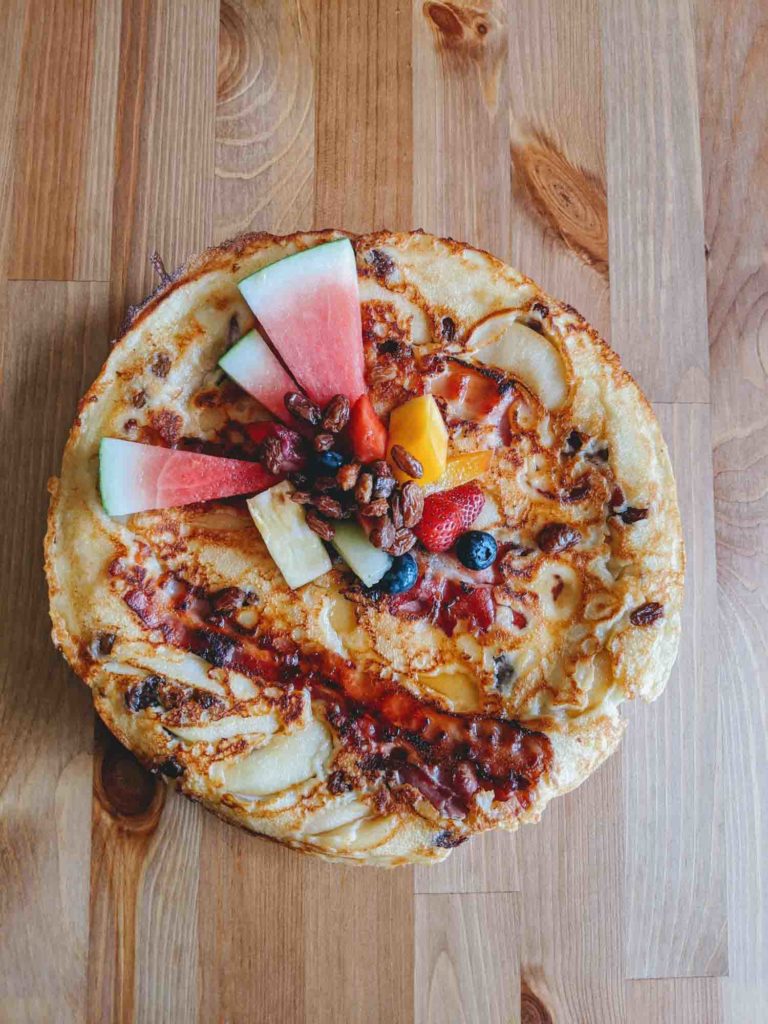 Dancing Moose Cafe pannenkoek, a Dutch pancake that has ingredients baked in with apple, raisin and bacon