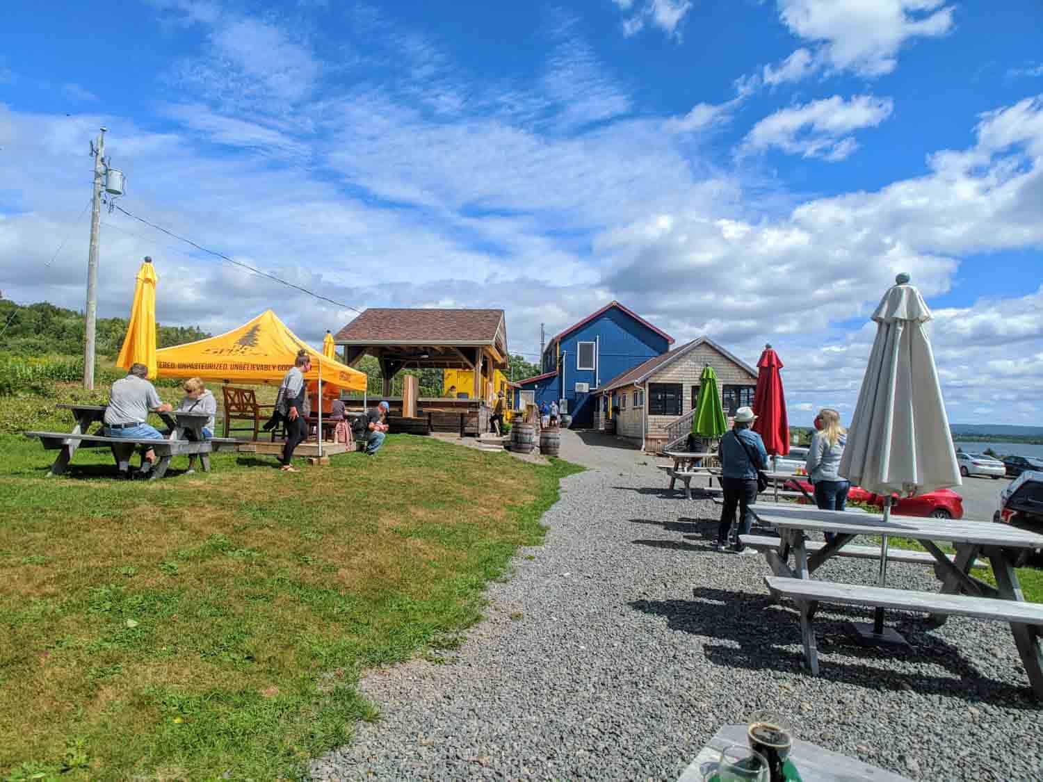 Big Spruce Brewing Company grounds with picnic tables