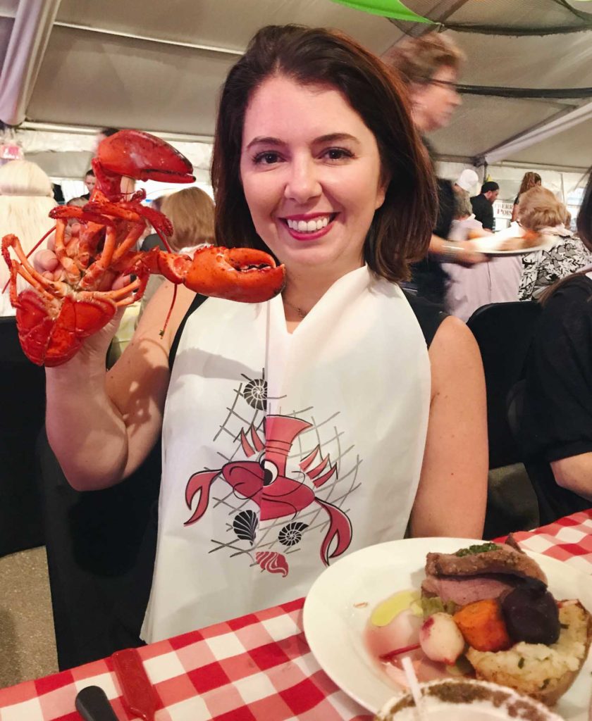 Ayngelina holding lobster at PEI International shellfish festival
