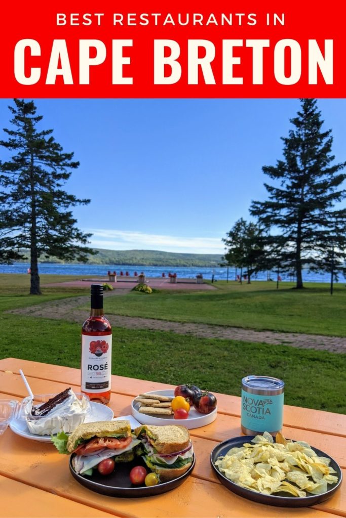 Pin for best restaurants in Cape Breton with picnic table full of local food