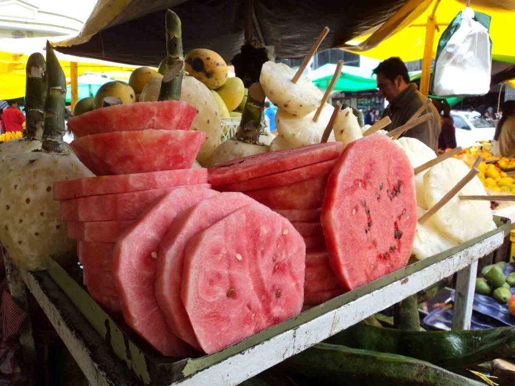 Watermelon sliced with pineapple in a Philippines fruit market