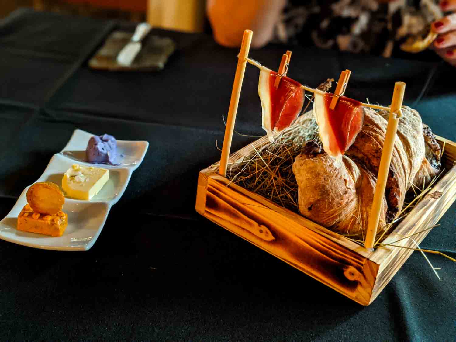 Dinner with three types of butter and bread at tasting menu at Trout Point Lodge