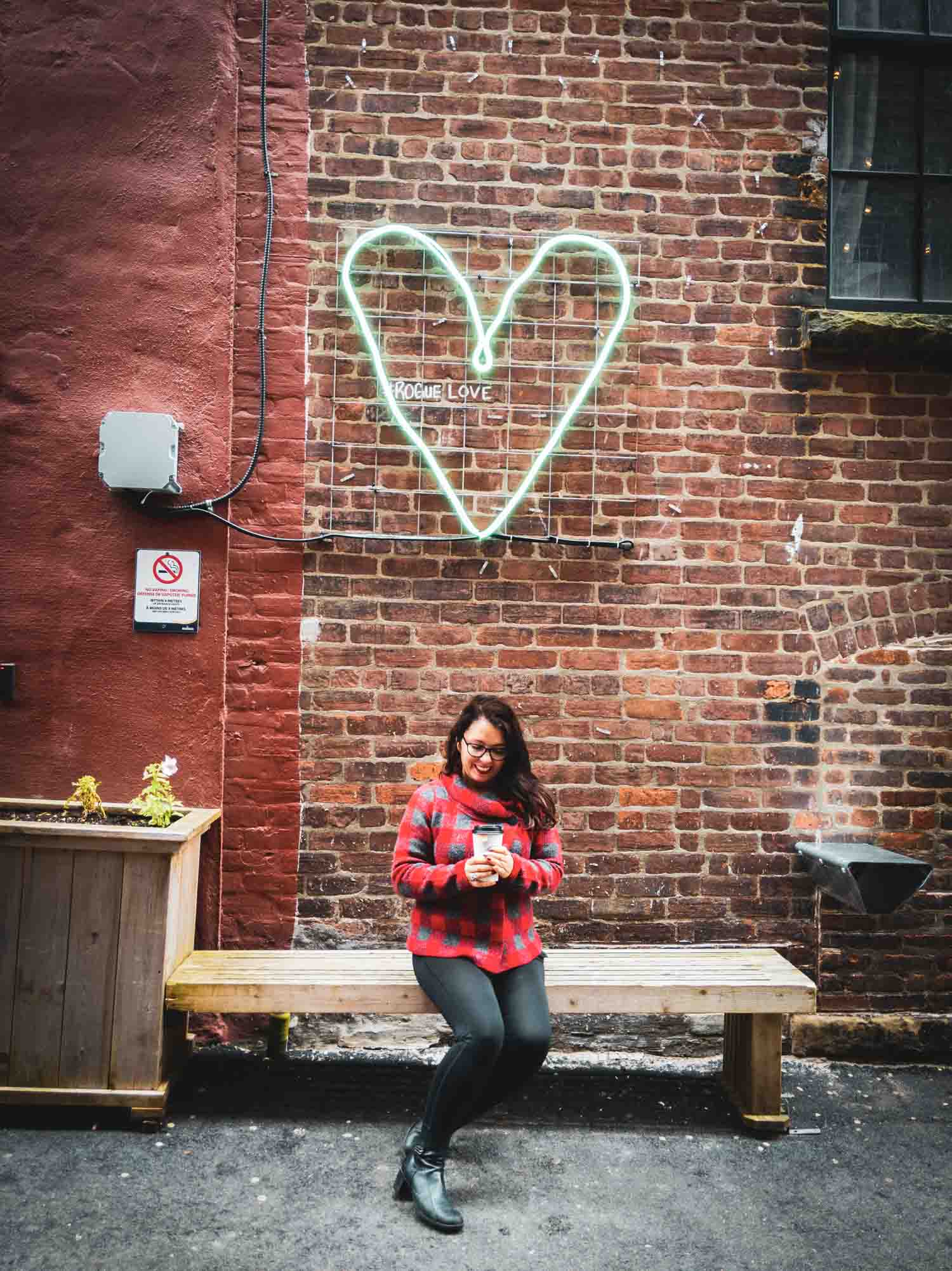 Ayngelina drinking coffee in Rogue Alley in Saint John New Brunswick