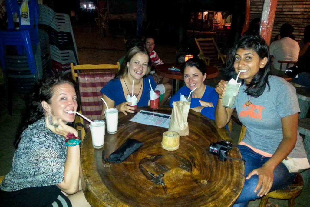 Group of women at beach bar in Canoa