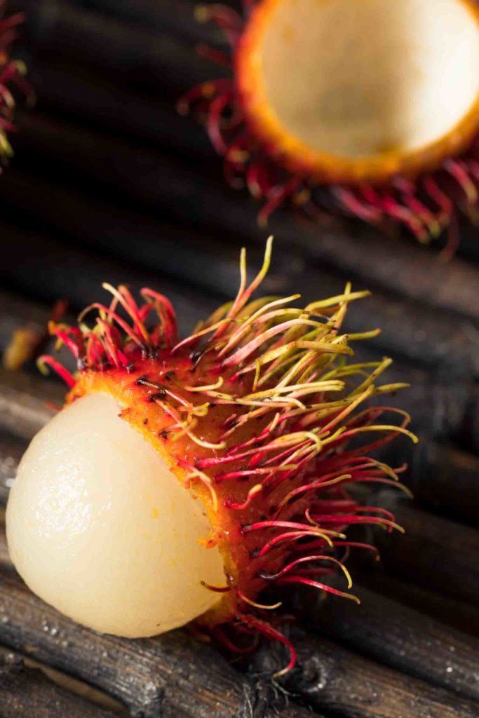 Raw Red Organic Rambutan Fruit Ready to Eat known as Anchotillo in Ecuador