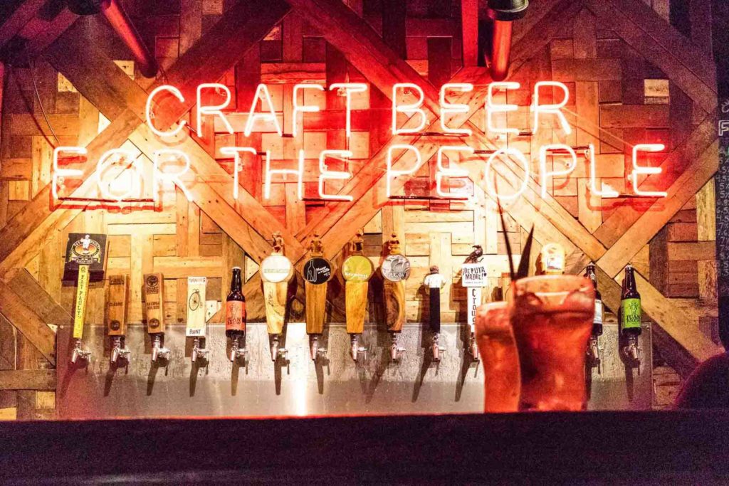 Filipino bar with beer taps, above it says Craft Beer for the People