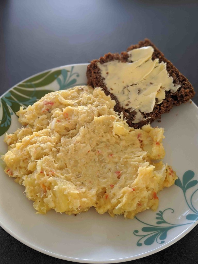 Icelandic fish stew, Plokkfiskur on a plate with rye bread.