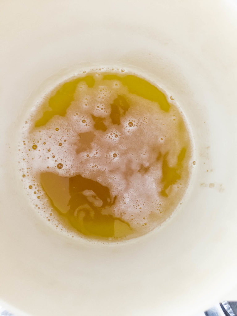 Browned butter in white bowl