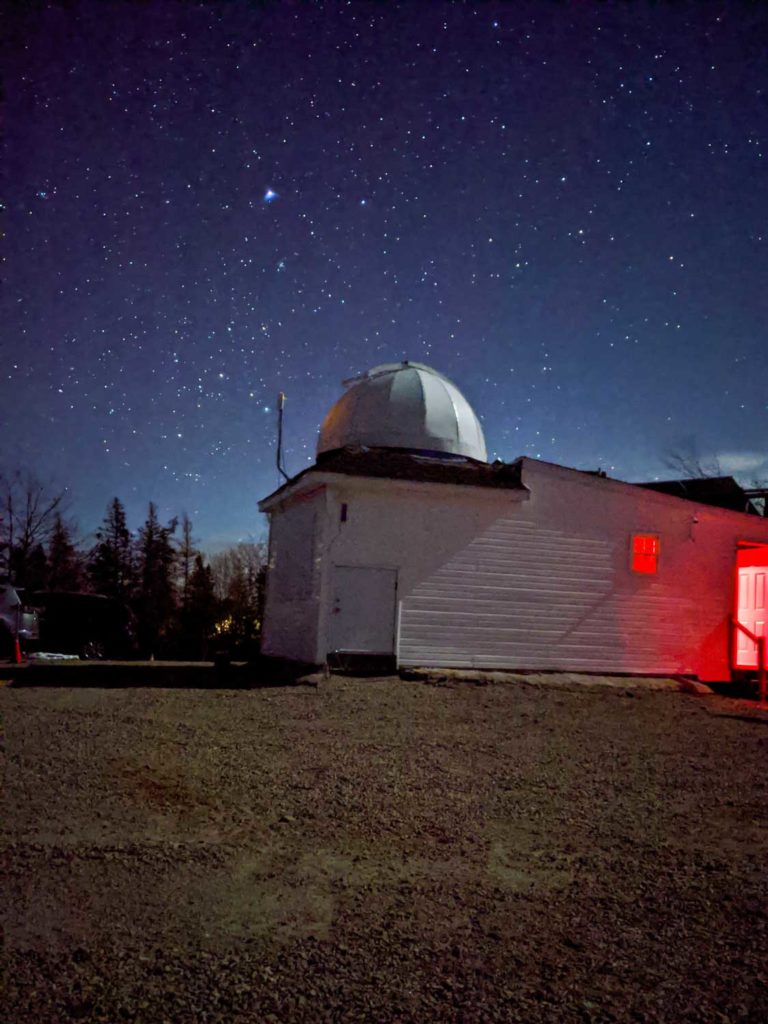 Deep Sky Eye observatory exterior at night