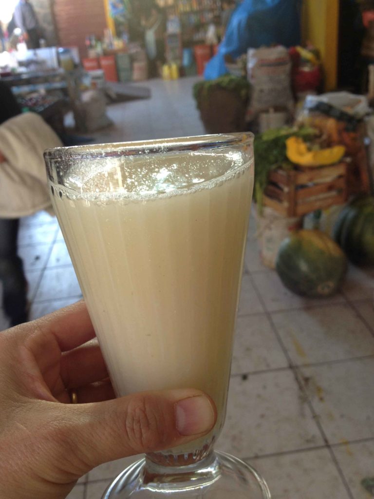 Guatemalan chicha in a hand in the market