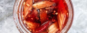 Top view of a mason jar of pickled rhubarb