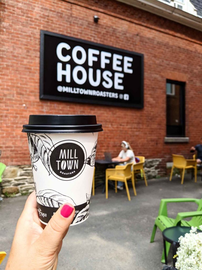 Fredericton Mill Town Roasters coffee up in hand