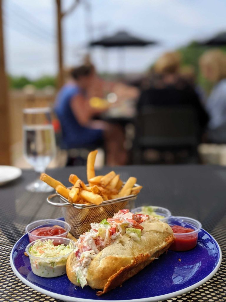 Wolostoq Warf one of the best Fredericton restaurants, lobster roll with French fries