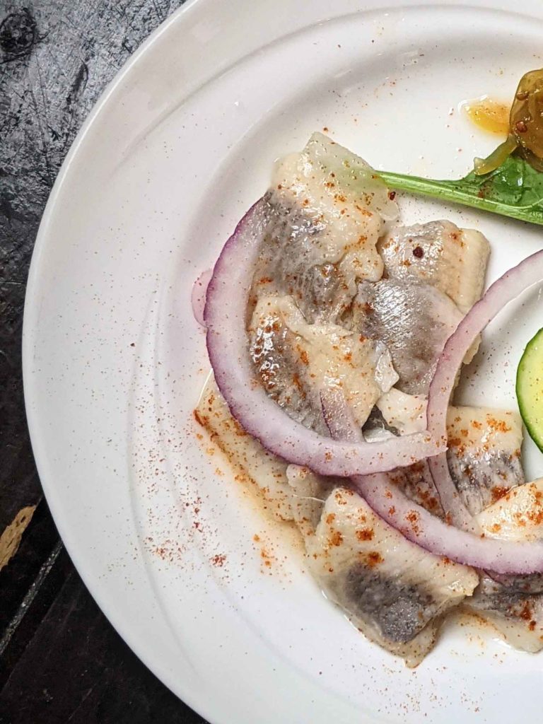 Jamaican snacks solomon gundy on a white plate