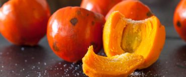 Slice of the exotic tropical fruit of Bactris gasipaes palm tree called chontaduro with salt