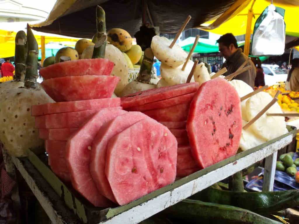 Sliced watermelon and fruits in Panama market