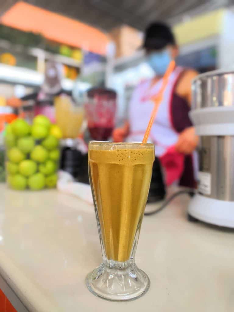Jugo especial Peruvian drink in a market (out of focus)