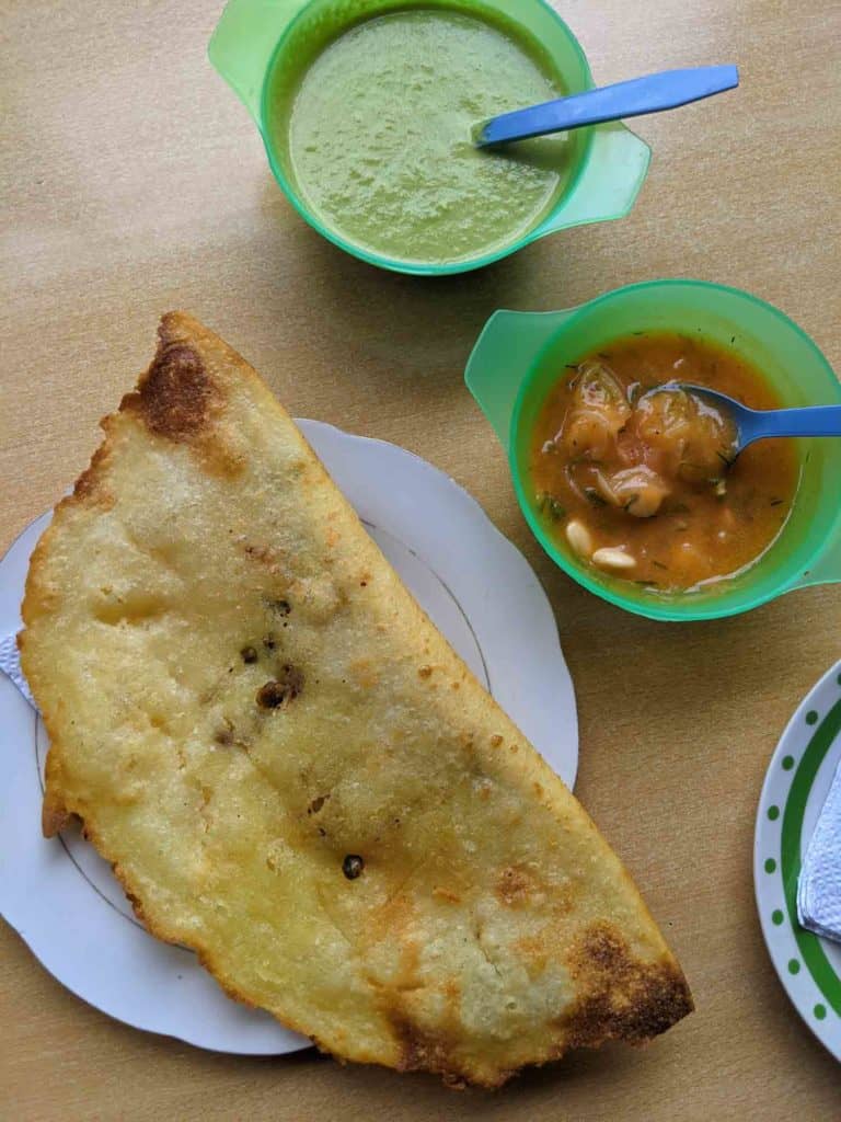 Quito Empanada de morocho with pepa de sambo and aji con chocho