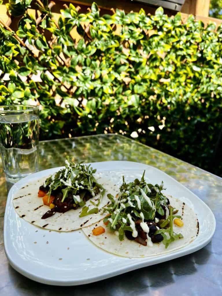 Sweet Black Bean tacos on a white plate