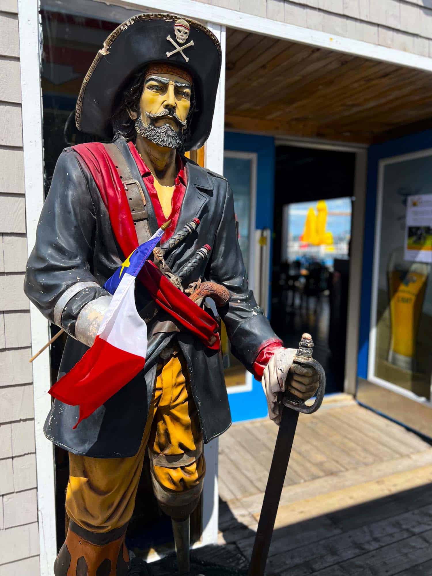 Acadian Captain statue at Captain Dans Bar and Grill Shediac New Brunswick at Point du Chene Wharf