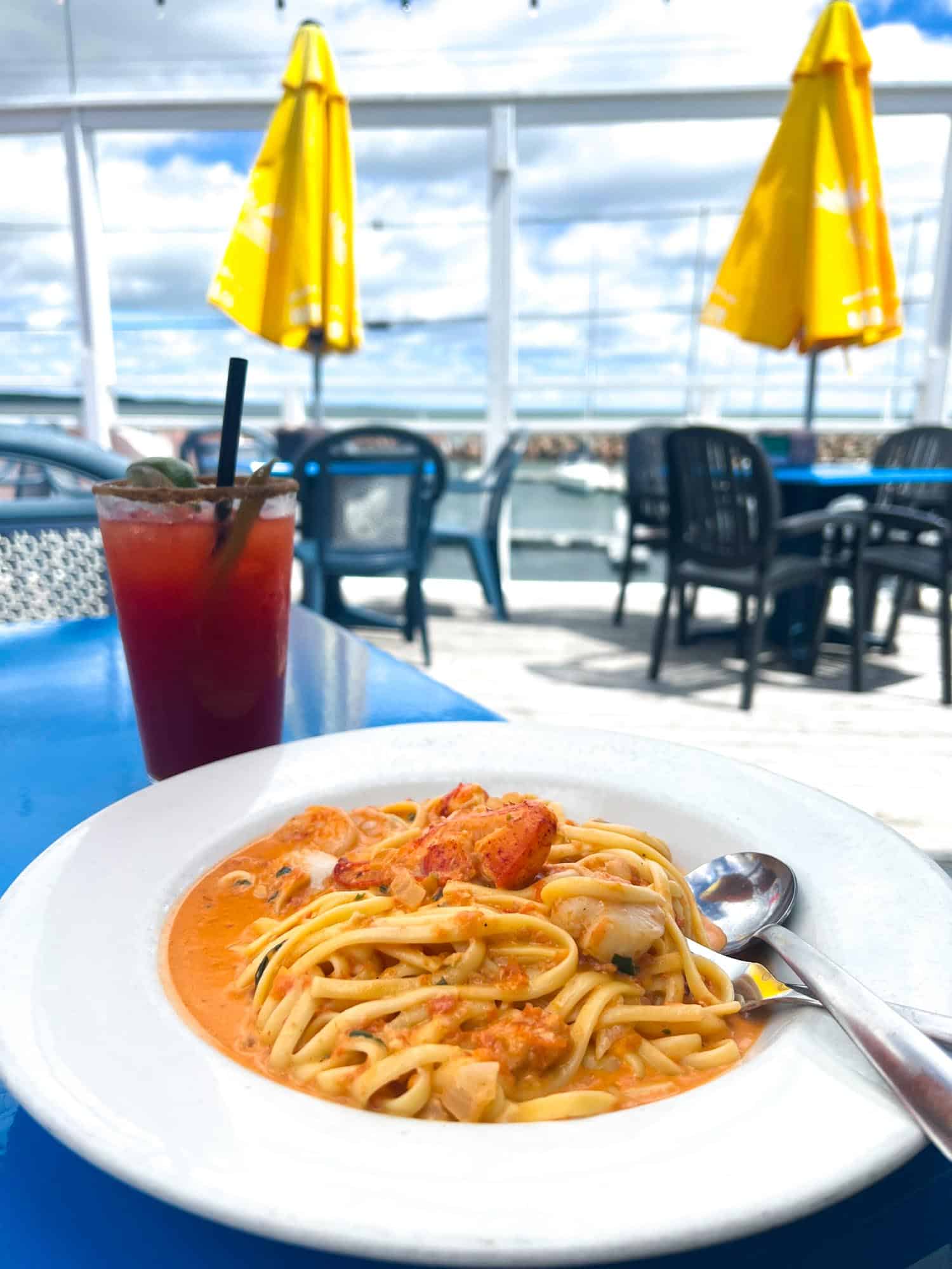Seafood Pasta on outdoor patio Captain Dans Bar and Grill Shediac New Brunswick at Point du Chene Wharf