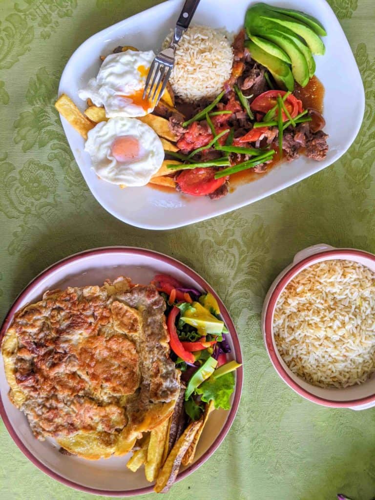 Apanado in Zaruma Ecuador, a traditional Ecuadorian meal on a table with green tablecloth