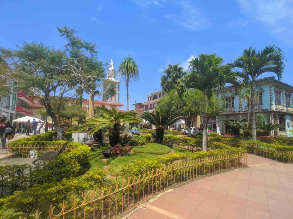 Zaruma Ecuador main square with palm trees and colonial architecture