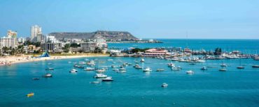 Salinas beach with apartment buildings and yacht club in Ecuador, Pacific Coast