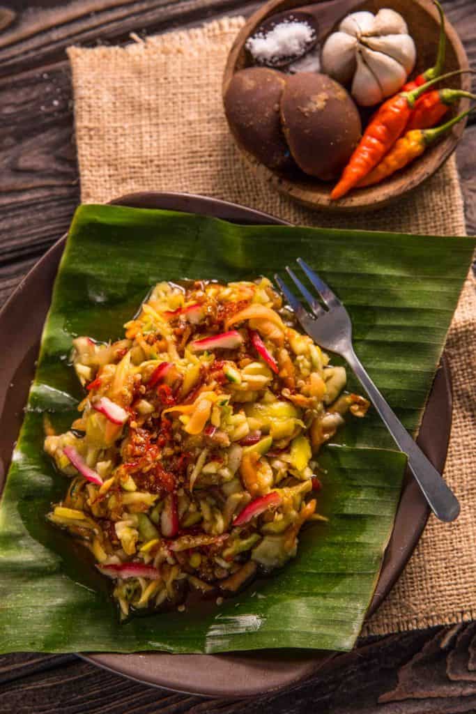 rujak on banana leaf indonesian fruit salad with hot spicy sauce