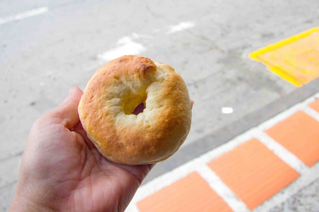 Colombian breakfast pan de bono in woman's hand