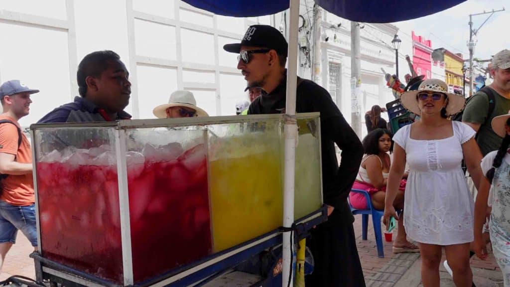 Corozo juice, a street drink in Colombia sold in fish tanks